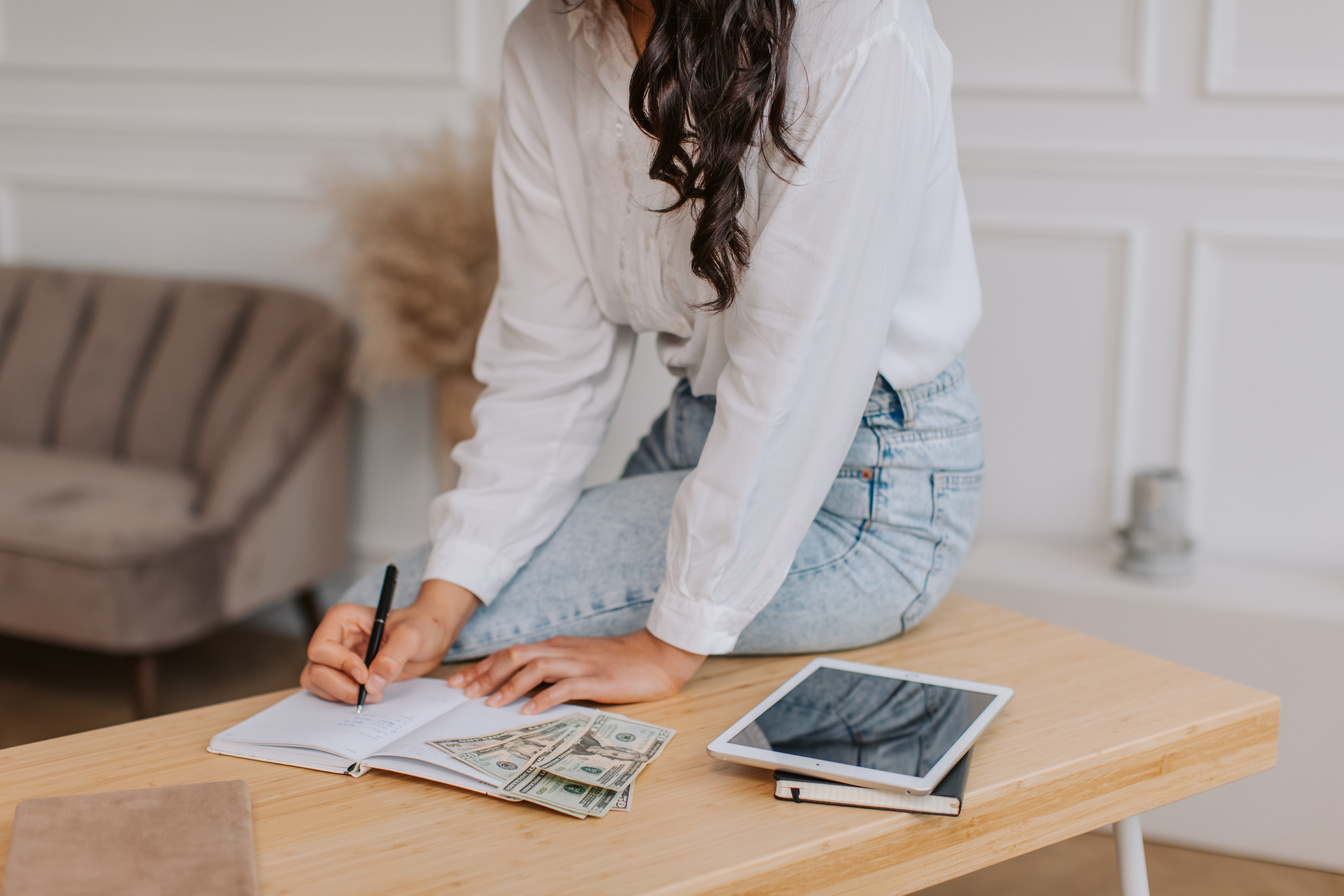Woman Budgeting Her Cash