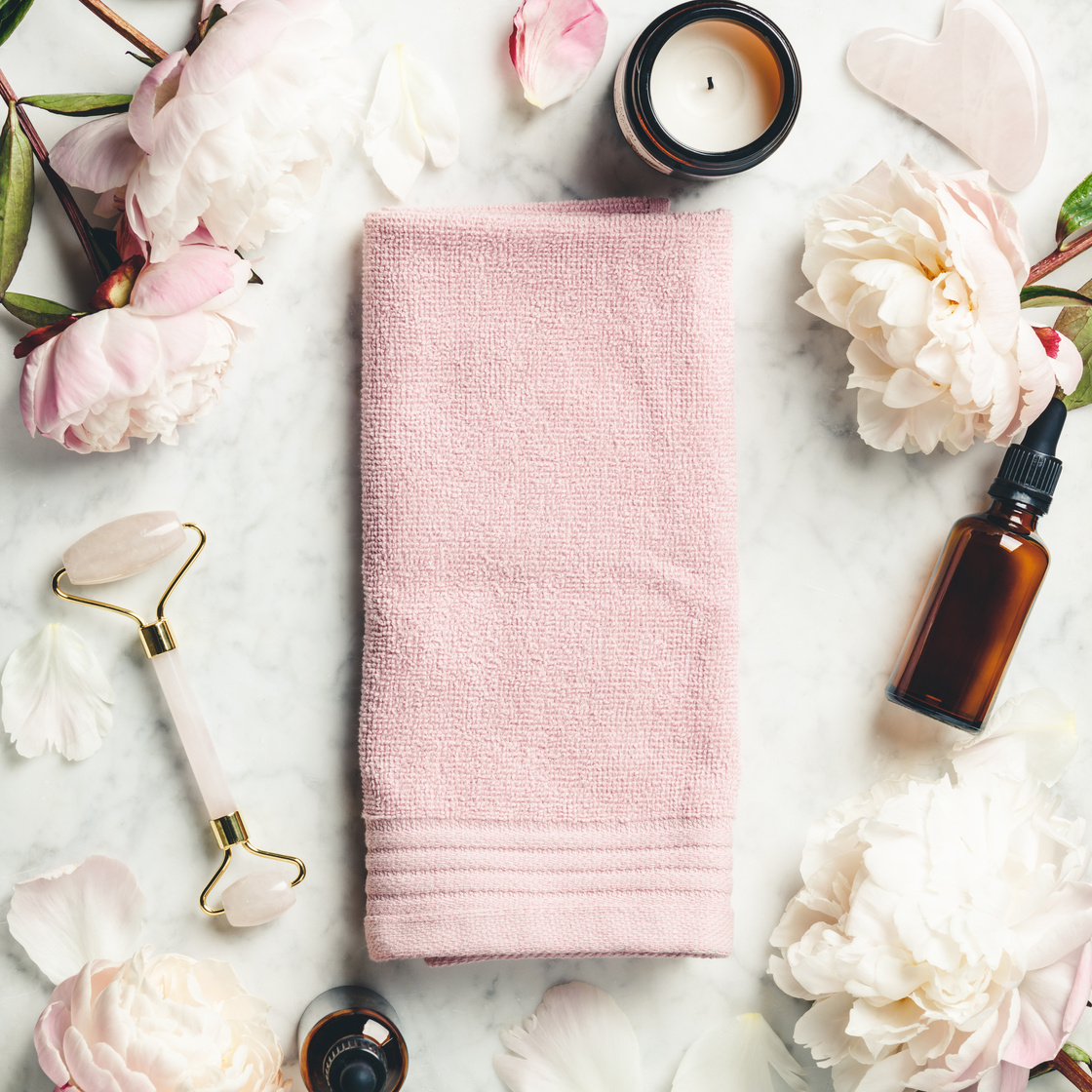 Facial Roller, Essential Oils, Towel and Skincare Products